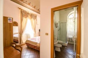 Koupelna v ubytování Hotel Iris