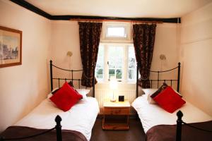 Кровать или кровати в номере Sheephouse Manor