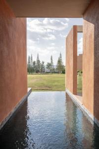 Bazén v ubytování De Capoc Resort nebo v jeho okolí