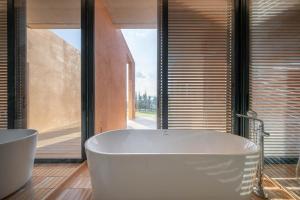 Koupelna v ubytování De Capoc Resort