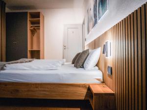 Posteľ alebo postele v izbe v ubytovaní Bergblick Apartment in Zentrumsnähe mit Garage