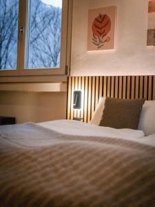 Posteľ alebo postele v izbe v ubytovaní Bergblick Apartment in Zentrumsnähe mit Garage