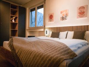 Posteľ alebo postele v izbe v ubytovaní Bergblick Apartment in Zentrumsnähe mit Garage
