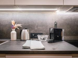 Príslušenstvo na prípravu kávy alebo čaju v ubytovaní Bergblick Apartment in Zentrumsnähe mit Garage