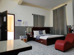 Postel nebo postele na pokoji v ubytování HOME Hotel