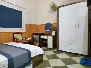 Postel nebo postele na pokoji v ubytování HOME Hotel