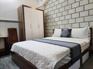 Postel nebo postele na pokoji v ubytování HOME Hotel