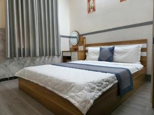 Postel nebo postele na pokoji v ubytování HOME Hotel