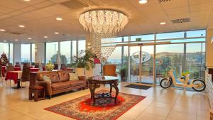Ruang duduk di Hotel Lavender - Oleander Resort
