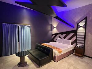 Katil atau katil-katil dalam bilik di Wei Feng Exquisite Motel Pintung Branch
