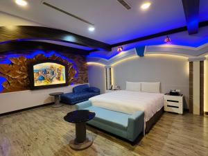 Katil atau katil-katil dalam bilik di Wei Feng Exquisite Motel Pintung Branch