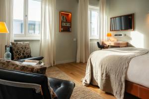 Katil atau katil-katil dalam bilik di Boutique & Design Hotel AUERSPERG