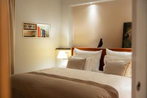 Katil atau katil-katil dalam bilik di Boutique & Design Hotel AUERSPERG