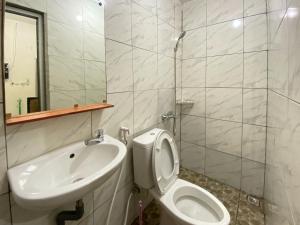 Koupelna v ubytování RedDoorz near RSUD Tidar Magelang
