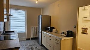 Kuchyň nebo kuchyňský kout v ubytování Cosy Corner Thionville Appart + 43 fotografií