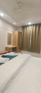 Postel nebo postele na pokoji v ubytování Hotel A10