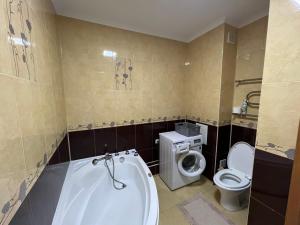 Ένα μπάνιο στο Banur Ип