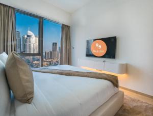 Katil atau katil-katil dalam bilik di EasyGo-Core Luxury 2BDR in Grande Signature Res panoramic view