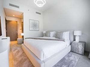 Katil atau katil-katil dalam bilik di EasyGo-Core Luxury 2BDR in Grande Signature Res panoramic view