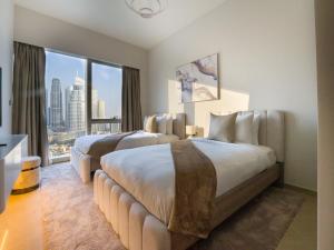 Katil atau katil-katil dalam bilik di EasyGo-Core Luxury 2BDR in Grande Signature Res panoramic view