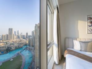 Katil atau katil-katil dalam bilik di EasyGo-Core Luxury 2BDR in Grande Signature Res panoramic view