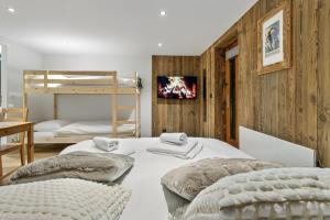 Postel nebo postele na pokoji v ubytování Studio élégant au cœur des Alpes + 10 fotografií