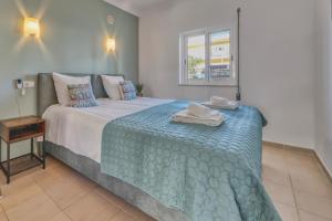 Ένα ή περισσότερα κρεβάτια σε δωμάτιο στο Casa Serena, Portugal +19 φωτογραφίες