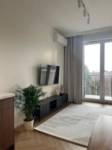 Postel nebo postele na pokoji v ubytování Apartament N13