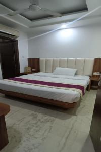 Postel nebo postele na pokoji v ubytování Hotel A10 International