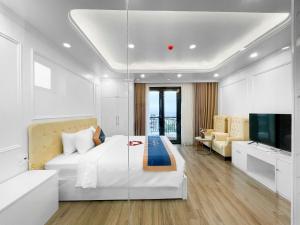 TV a/nebo společenská místnost v ubytování Chemi Hanoi Airport Hotel