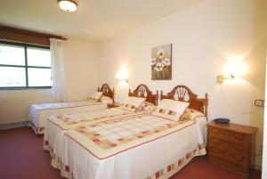Postel nebo postele na pokoji v ubytování Hotel Principado De Europa + 37 fotografií