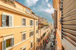 a view of a city street from a building at Elegantis Purificazione Suite Apartment in Rome