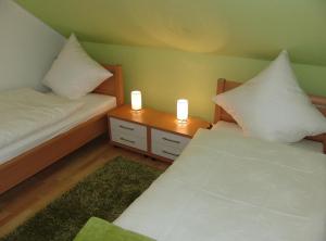 Postel nebo postele na pokoji v ubytování Venner Gasthaus