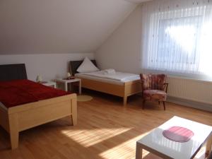Postel nebo postele na pokoji v ubytování Venner Gasthaus
