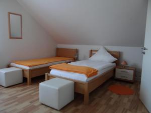Postel nebo postele na pokoji v ubytování Venner Gasthaus