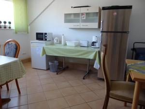 Kuchyň nebo kuchyňský kout v ubytování Venner Gasthaus