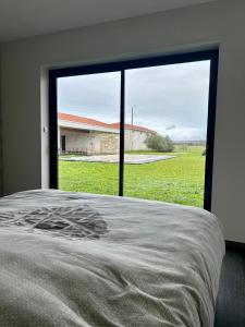 Un ou plusieurs lits dans un hébergement de l'établissement Villa De L'Amiral - LUXE ET DETENTE A POMMEVIC