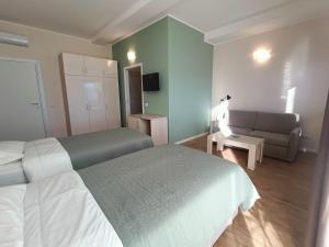 Postel nebo postele na pokoji v ubytování Bistro by Sigor