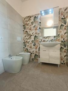 Koupelna v ubytování Bistro by Sigor + 28 fotografií