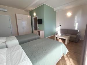 Postel nebo postele na pokoji v ubytování Bistro by Sigor