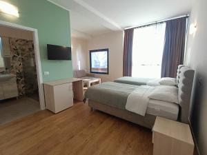 TV a/nebo společenská místnost v ubytování Bistro by Sigor