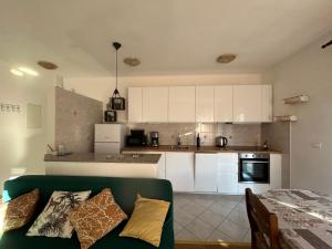 Kuchyňa alebo kuchynka v ubytovaní Apartman Petra