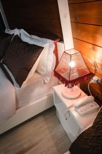 Postel nebo postele na pokoji v ubytování Hotel Aria