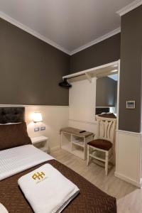 Postel nebo postele na pokoji v ubytování Hotel Aria