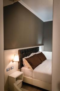 Postel nebo postele na pokoji v ubytování Hotel Aria