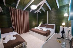 Postel nebo postele na pokoji v ubytování Hotel Aria