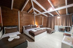 Postel nebo postele na pokoji v ubytování Hotel Aria