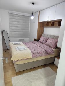 Postel nebo postele na pokoji v ubytování Stan na dan Lane Pale