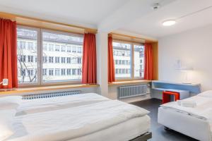 Letto o letti in una camera di Hotel Marta