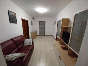 Μια τηλεόραση ή/και κέντρο ψυχαγωγίας στο Appartamento vacanze Tres - Predaia